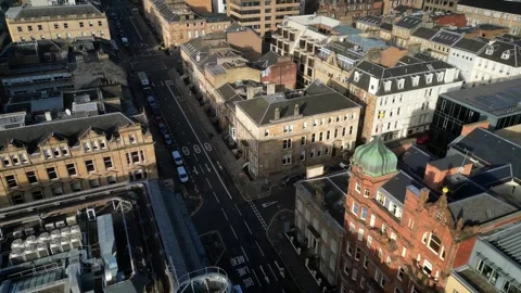 Diagonal drone pass shot over West George Street in Glasgow. Stock Footage 258368923