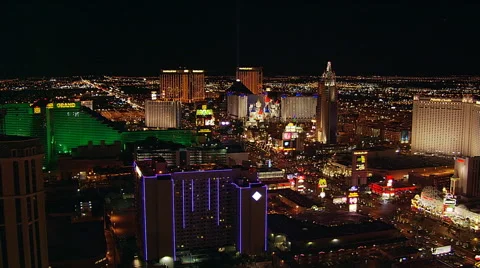 Diagonal flight across The Strip toward Excalibur in Las Vegas. Shot in 2005. Stock Footage 59526430