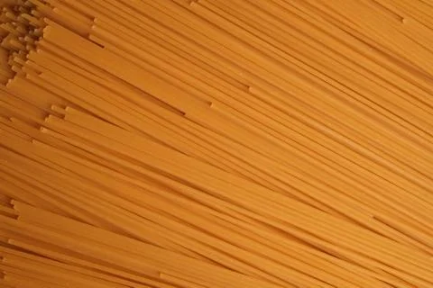 Diagonal image of raw spaghetti pasta Stock Photos