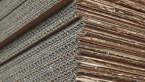 Diagonal layers of stacked corrugated cardboard in industrial plant Stock Footage 346188163