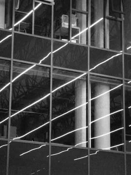 Diagonal light reflections on glass facade Stock Photos