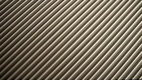 Diagonal metal ribbed pattern creating a textured background Stock Photos