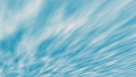 Diagonal movement of striped clouds in a blue sky . Stock Footage 234769749