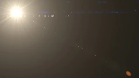 Diagonal Moving lens flare effect on bla... | Stock Video | Pond5