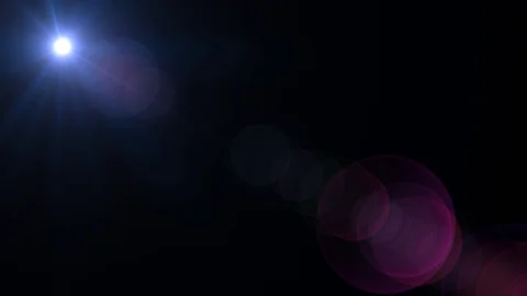 Diagonal Moving lens flare effect on bla... | Stock Video | Pond5
