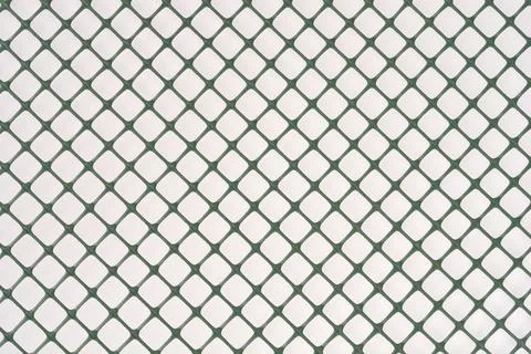 Diagonal pattern of green plastic garden mesh Stock Photos