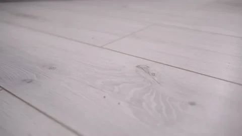 Diagonal pattern of white wood effect laminate in motion Stock Footage 236195806