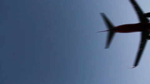 Diagonal Plane Overhead Pass Stock Footage 8978560