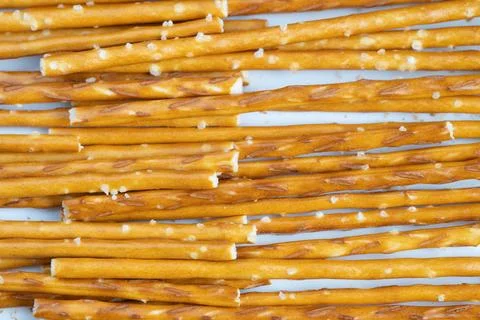 Diagonal pretzel sticks create dynamic composition studio shot suitable for culi Stock Photos