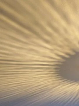 Diagonal Radial Light Projection Pattern On Textured Wall Stock Photos
