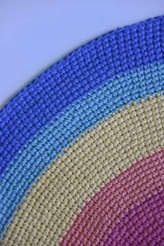 Diagonal rainbow knitted pattern from the corner Stock Photos