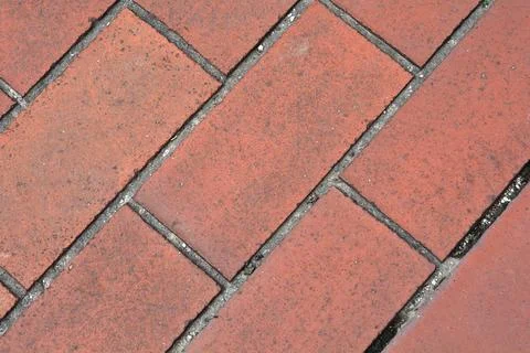 Diagonal Red Paving Bricks Close Up Texture Background 库存照片