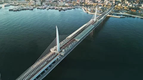 Diagonal Reverse Drone Shot of Halic Metro Bridge Stock Footage 345937002