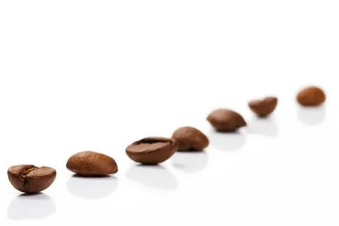 Diagonal row of coffee beans Stock Photos