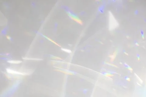 Diagonal shadow and rays of light on a white wall Stock Photos