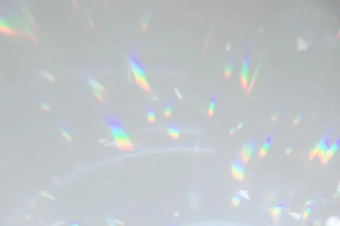 Diagonal shadow and rays of light on a white wall Stock Photos