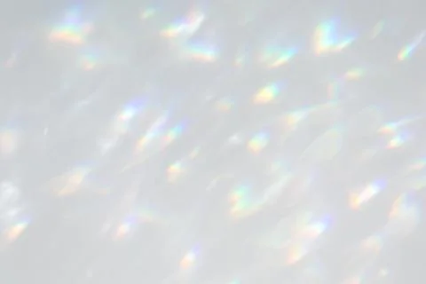 Diagonal shadow and rays of light on a white wall Stock Photos