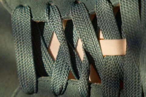 Diagonal shoelace pattern with contrast lighting, interlaced loops and eyelet Stock Photos