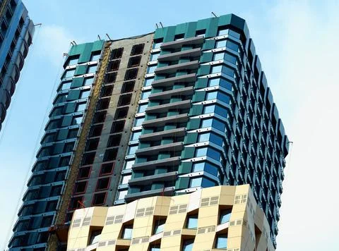 Diagonal skyscraper under construction background Stock Photos