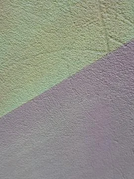 Diagonal split composition of light green and violet textured surfaces Stock Photos