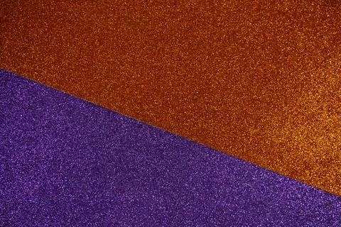 Diagonal Split Halloween-Themed Glitter Background in Orange and Purple Stock Photos