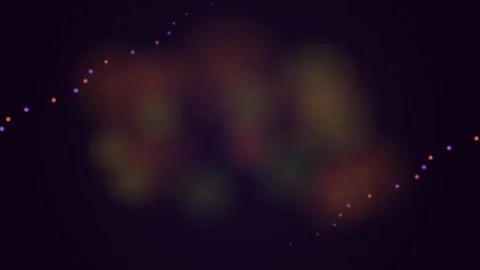 A diagonal string of glowing multicolored lights against a dark background Stock Footage 338310018