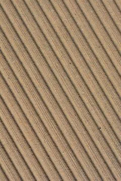Diagonal texture of grooved composite decking board 스톡 사진