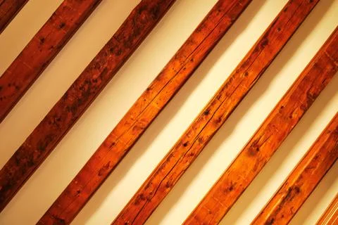 Diagonal timber pattern on beige background with gradient shadows. Stock Photos