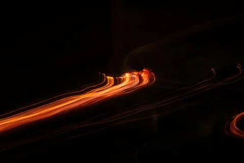 Diagonal trail of fire in the darkness Stock Illustration