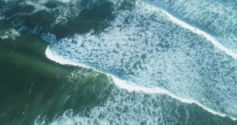 Diagonal waves breaking in the sea the concept of constant motion and energy Stock Footage 326701612