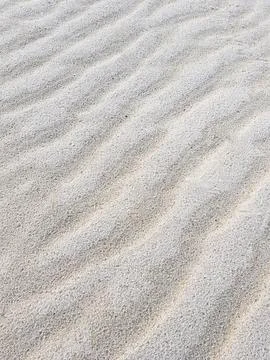Diagonal waves of sand. Sandy texture natural background Photos