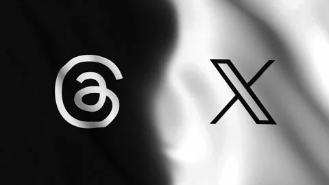 Diagonal waving flag of Threads app and X (Formerly Twitter) logo Stock Footage 247551761