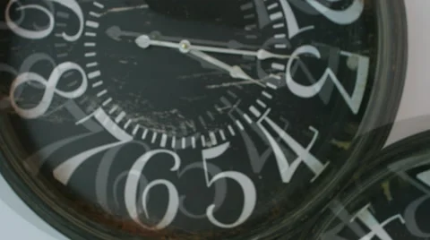 The dial blurrier arrows on the clock.  Stock Footage 59737097