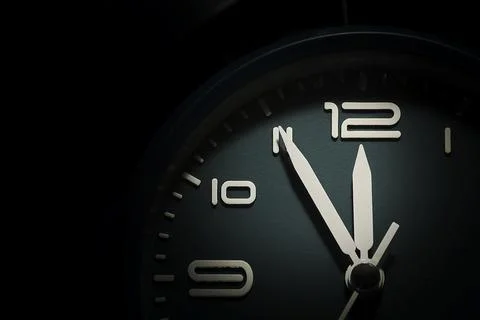 Dial of a clock showing five minutes to twelve Stock Photos