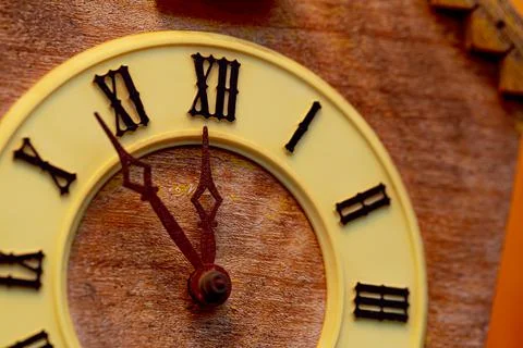 The dial of the clock shows the approach of the new year as the hands converge. Stock Photos