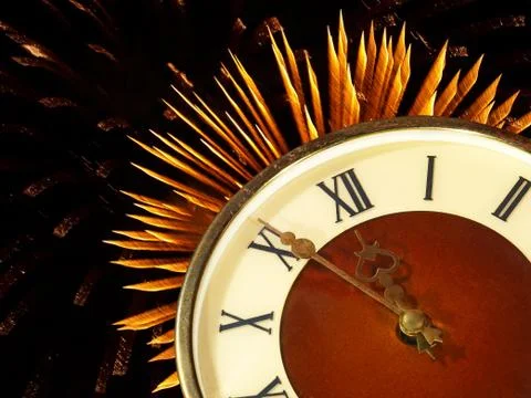 Dial of hours on a golden firework background.eve of new year. イラスト素材