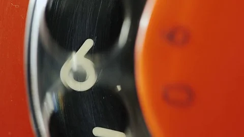 Dial the number on the old disk phone. Close-up, digit 6 Stock Footage 84596408