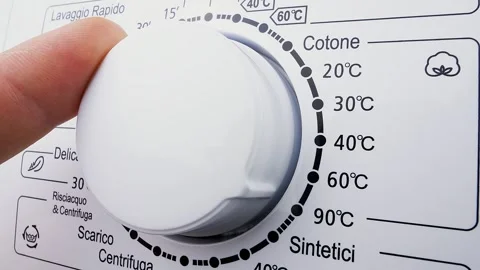 Dial settings and temperature options on a washing machine display Stock Footage 325037686