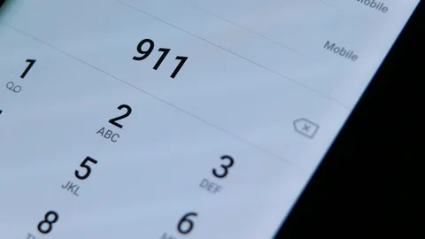 Dialing 911 Stock Footage