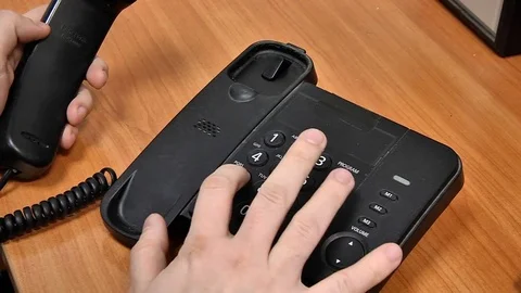 Dialing on a touch tone telephone Stock Footage 72841845