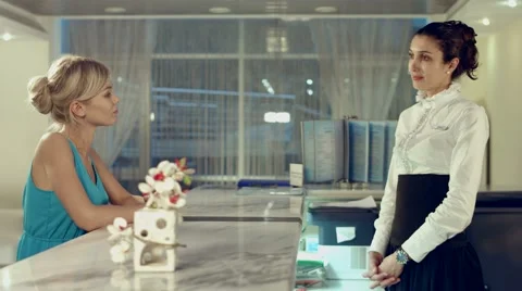 Dialogue between client and the hotel manager Stock Footage 60142574