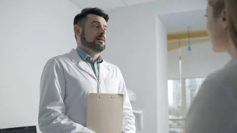 Dialogue between two medical professionals Stock-Footage 75031312