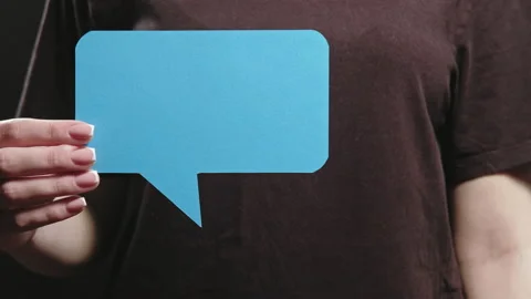 Dialogue icon hand blue blank speech bubble text Stock Footage 134697089