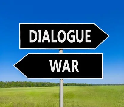 Dialogue instead war symbol. Concept words Dialogue and War on beautiful bl.. Фото