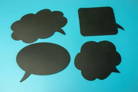 Dialogue or speech empty boxes with copy space. Dialogue bubbles on blue back Stock Photos