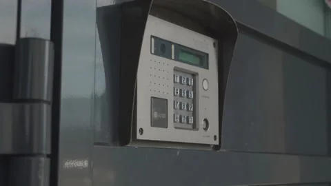 Dials numbers on the intercom Stock Footage 132494296