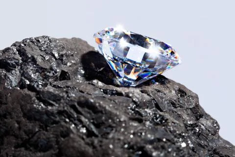 Diamond and coal Stock Photos
