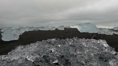 Diamond Beach, black sand beach with Jökulsárlón icebergs, Iceland. Stock Footage 221789334