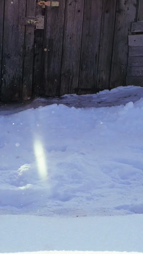 Diamond Dust Ice Crystals Glittering Against Rustic Barn – 180fps Stock Footage 328451170