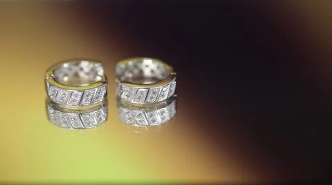 Diamond earrings from white gold. Stock Photos